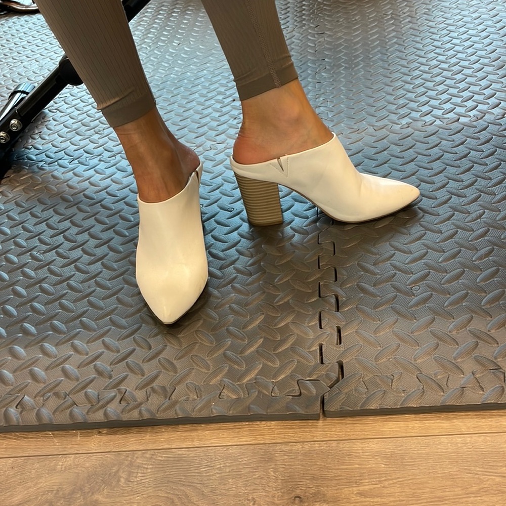 Women’s white closed toe open back heel